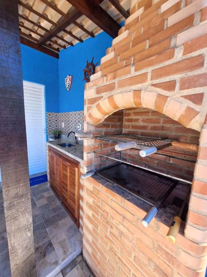 Churrasqueira de tijolos na área gourmet